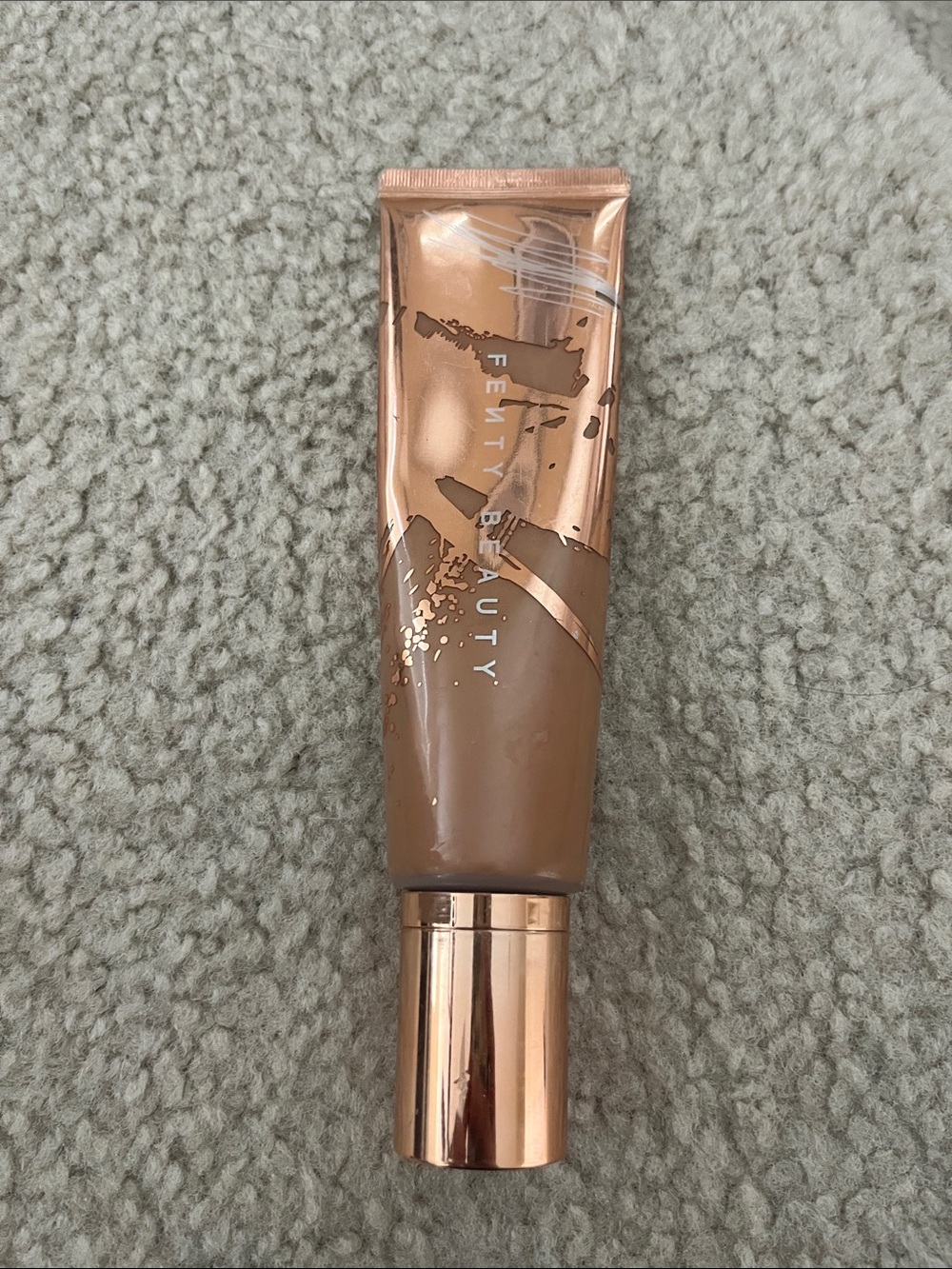 Fenty Beauty body sauce in hunnie hunnie